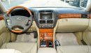 Lexus LS 430 Imported 1/2 Ultra 2006 model, white color, leather opening, wood wheels, electric mirrors, electric