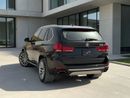 BMW X5 50i Exclusive 4.4L (7 Seater) BMW X5 XDRIVE 50i | 4.4L TWIN TURBO V8 – 450 BHP | 2014 | GCC SPECS