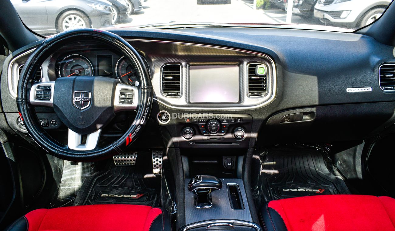 Dodge Charger Import - number one - manhole - leather - rear spoiler - cruise control - wheels - sensors in excell