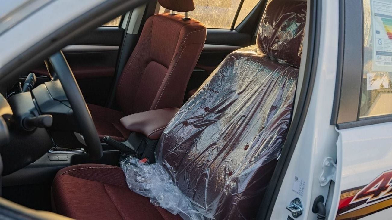 تويوتا هيلوكس Toyota Hilux pickup double cabin Petro engine 2.7L 4x4 white with red interior fully automatic