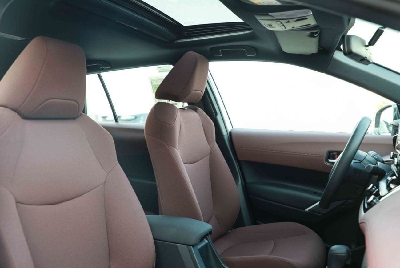 تويوتا كورولا كروس 2024 TOYOTA COROLLA CROSS 1.8 Hybrid MID - SILVER inside RED | Export Only