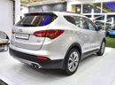 Hyundai Santa Fe EXCELLENT DEAL for our Hyundai SantaFe 4WD V6 ( 2016 Model ) in Silver Color GCC Specs
