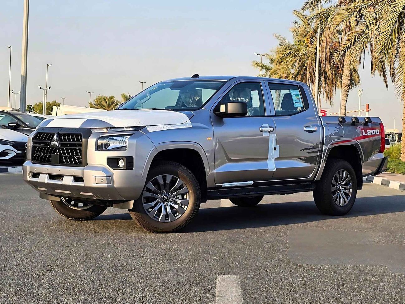 ميتسوبيشي L200 2.4L DSL/ A/T / FULL OPTION / 4WD (CODE# 68019)