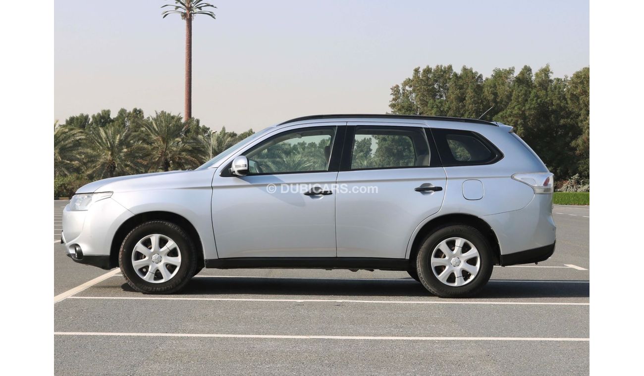 ميتسوبيشي آوتلاندر 2014 | MITSUBISHI OUTLANDER - 7 SEATER CAPACITY PETROL A/T WITH GCC SPECS AND EXCELLENT CONDITION
