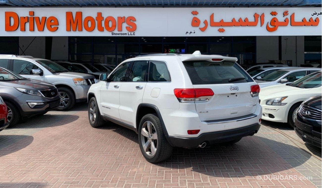 جيب جراند شيروكي JEEP CHEROKEE LIMITED 5.7 V8 JUST ARRIVED!! NEW ARRIVAL ONLY 1490X60 MONTHLY UNLIMITED KM WARRANTY