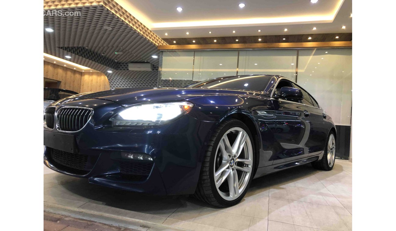 BMW 640i خليجي مالك واحد تشيكات وكالة فول اوبشن اربع فصوص كاميرات حساسات Display نفكيشن بصمة غراند كوبيه