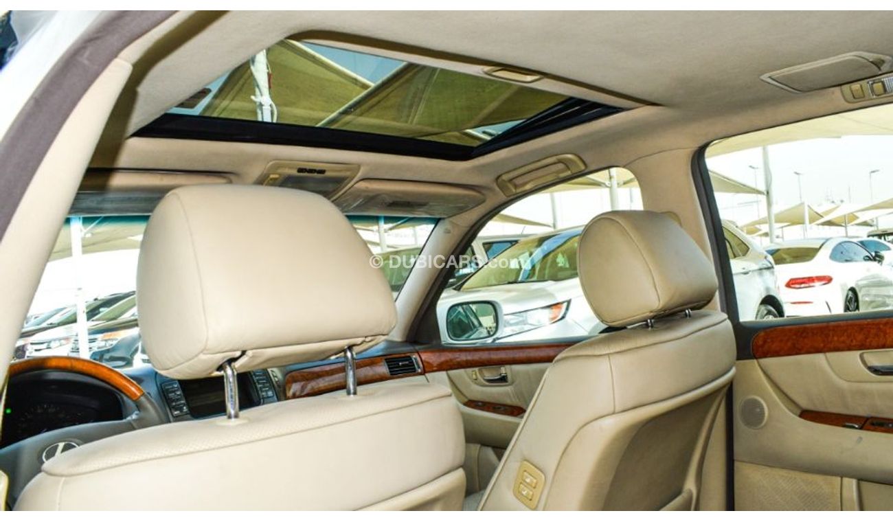 لكزس LS 430 لكزس LS430 وارد 1/2 موديل 2006 لون أبيض فتحه جلد رنجات خشب مرايا كهرباء كرسي كهرباء رنجات مثبت سرعة
