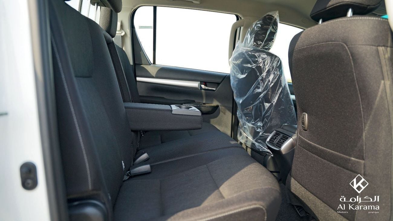 تويوتا هيلوكس 2.4 لتر | SR5 | دفع رباعي يدوي | هيكل عريض | تحكم مناخي ثنائي المناطق | مرايا ونوافذ كهربائية