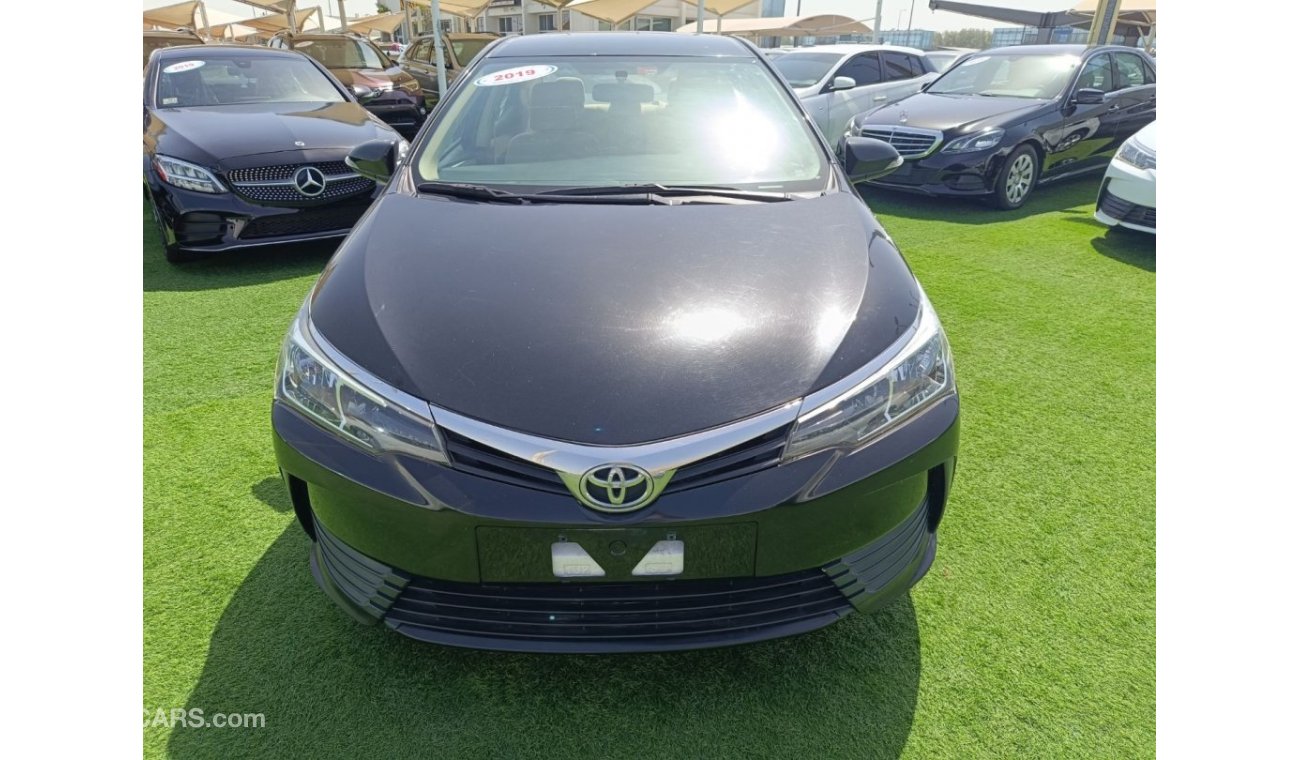 Toyota Corolla XLI Pre-owned Toyota Corolla for sale in Sharjah. White 2019 model, available at Rebou Najd Used Car