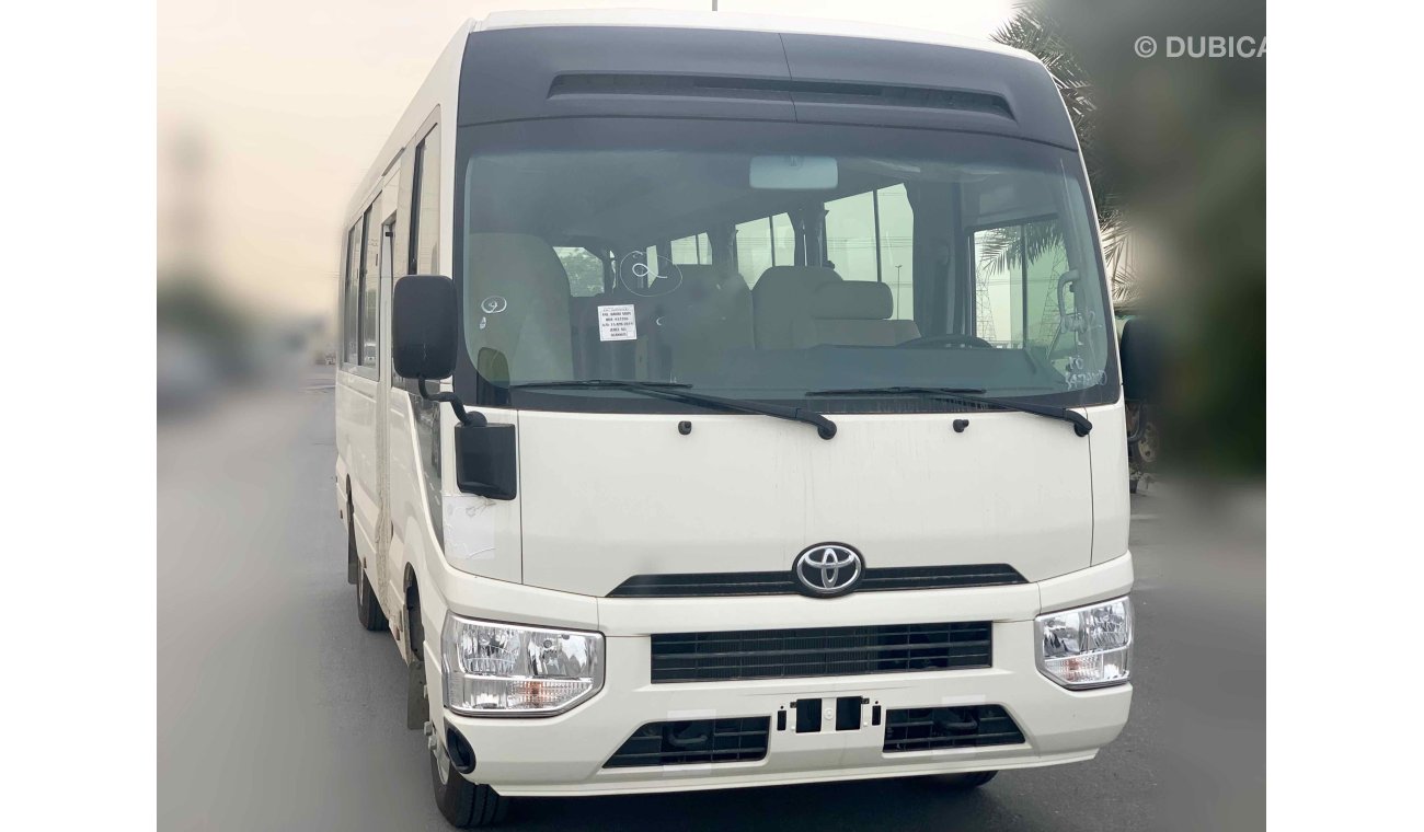 Toyota Coaster FULL OPTION — V6 — 4200cc — DIESEL—22 SEAT -- 3 POINT SEAT BILT - LUGGAGE RACK - CURTAINS - FRIDGE