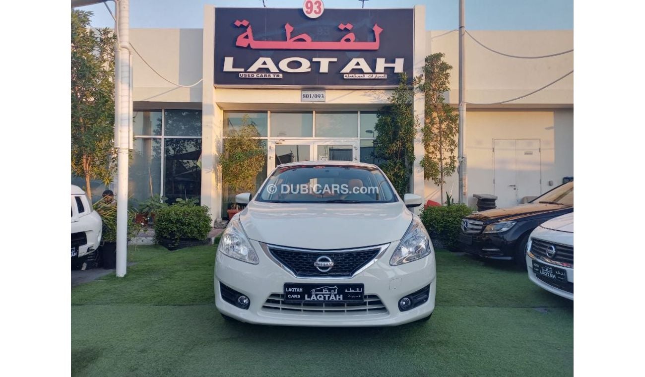 نيسان تيدا خليجى موديل 2013 لون أبيض شاشة كاميرا خلفية بدون حوادث بحالة ممتازة لاتحتاج لأى مصاريف