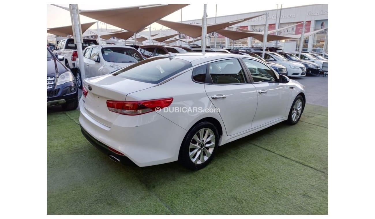 كيا أوبتيما موديل 2016 وارد مثبت سرعة تحكم رنجات شاشة كاميرا خلفية حساسات بحالة ممتازة لاتحتاج لأى مصاريف