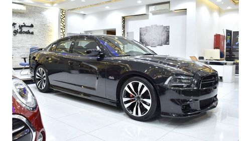 Dodge Charger EXCELLENT DEAL for our Dodge Charger SRT8 ( 2013 Model ) in Black Color GCC Specs
