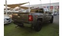 Chevrolet Silverado Pickup model 2009 imported silver color, equipped with two side halves, tyote wheels, sensors cruise