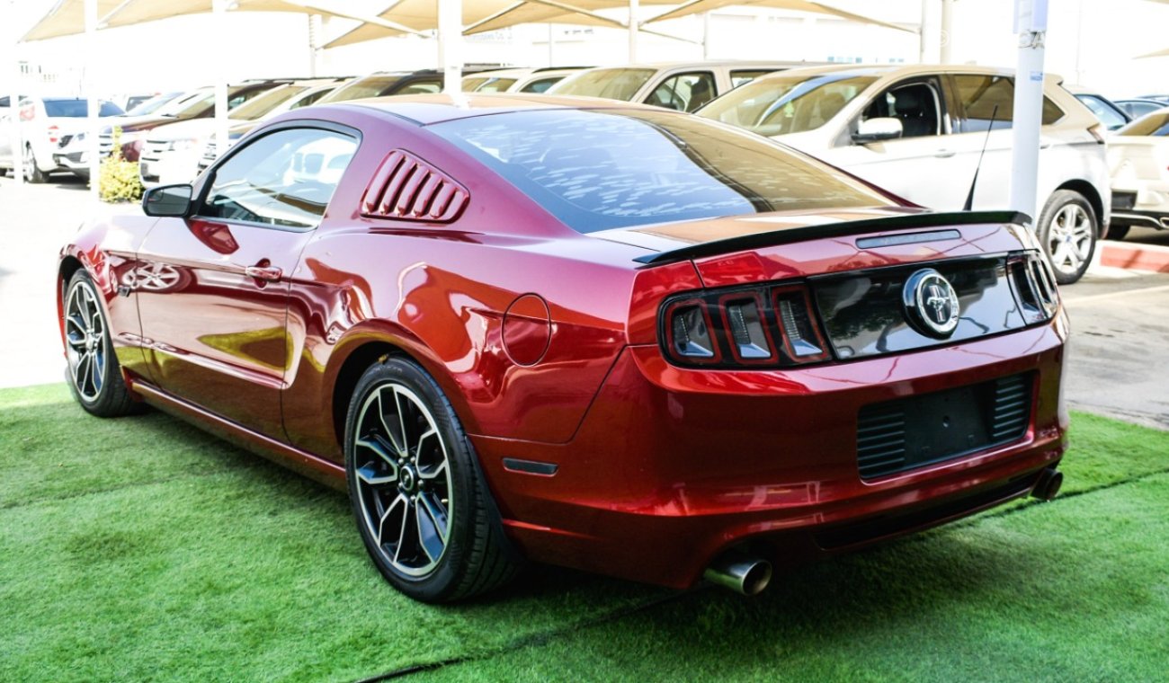 Ford Mustang Coupe, red color inside black, in excellent condition, you do not need any expenses