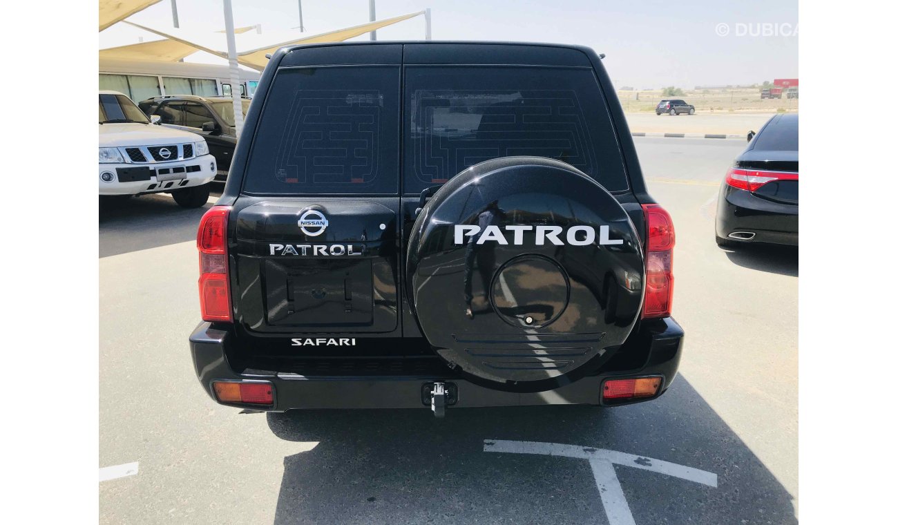 Nissan Patrol Safari فل ابشن صبغة وكاله تشييكات وكاله بحاله ممتاذه