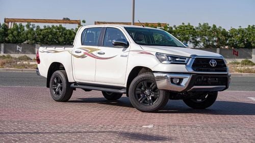 Toyota Hilux GLX 2.7L - Manual - White Inside Maroon | Export Only
