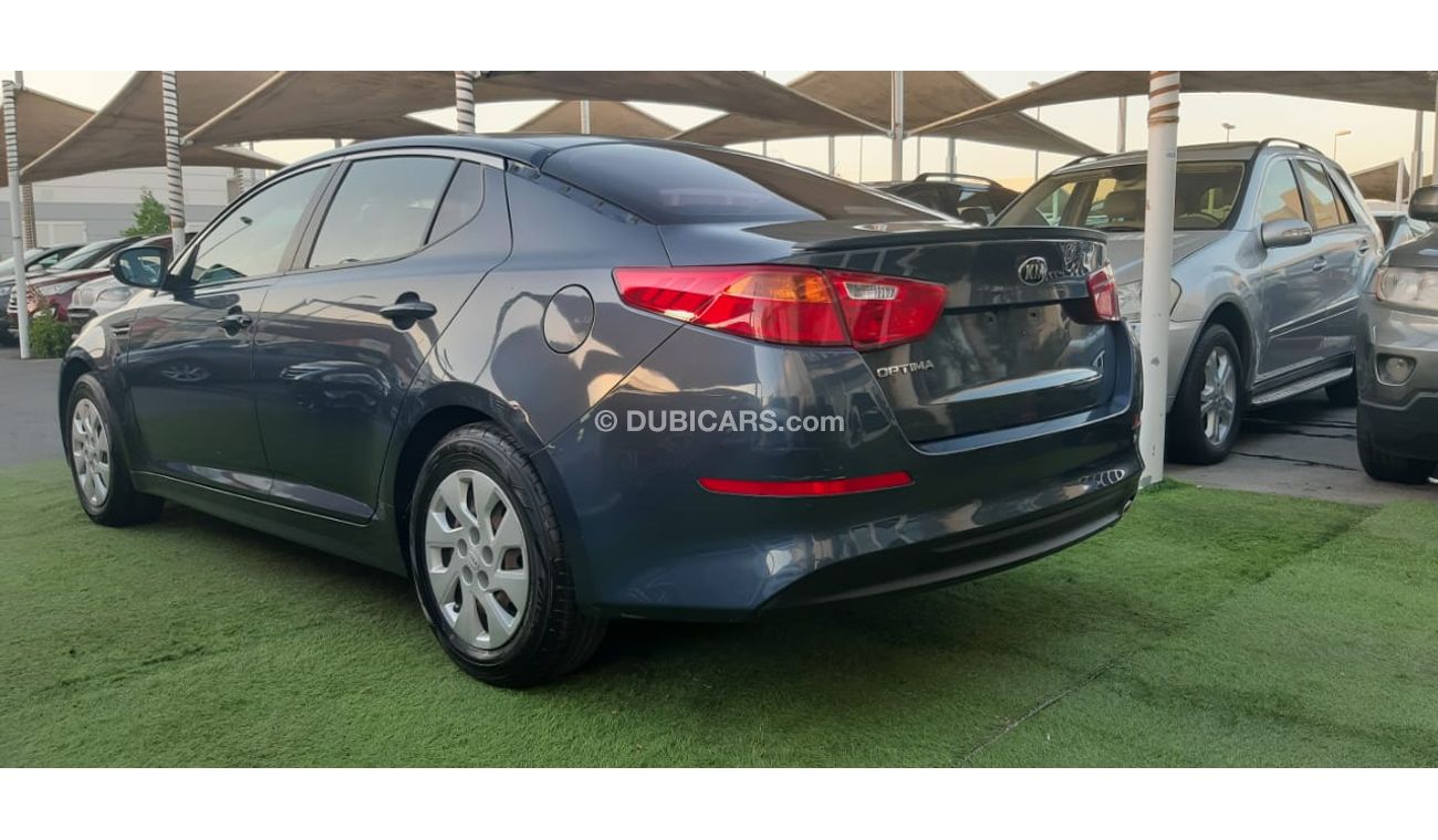 كيا أوبتيما خليجى رقم 2  شاشة   كاميرا  مثبت  سرعة  جناح خلفى رنجات حساسات أنوار ضباب بحالة ممتازة