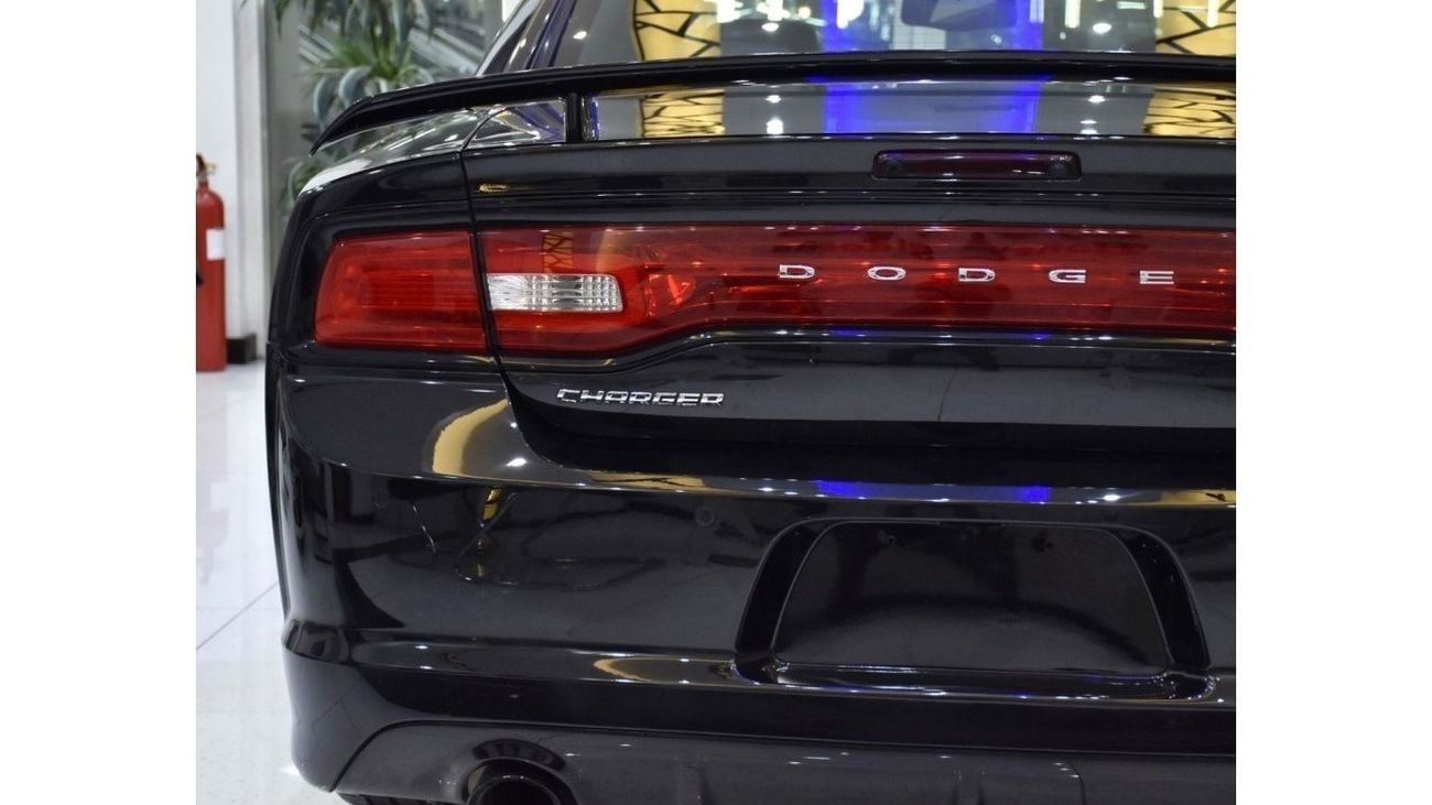 Dodge Charger EXCELLENT DEAL for our Dodge Charger SRT8 ( 2013 Model ) in Black Color GCC Specs