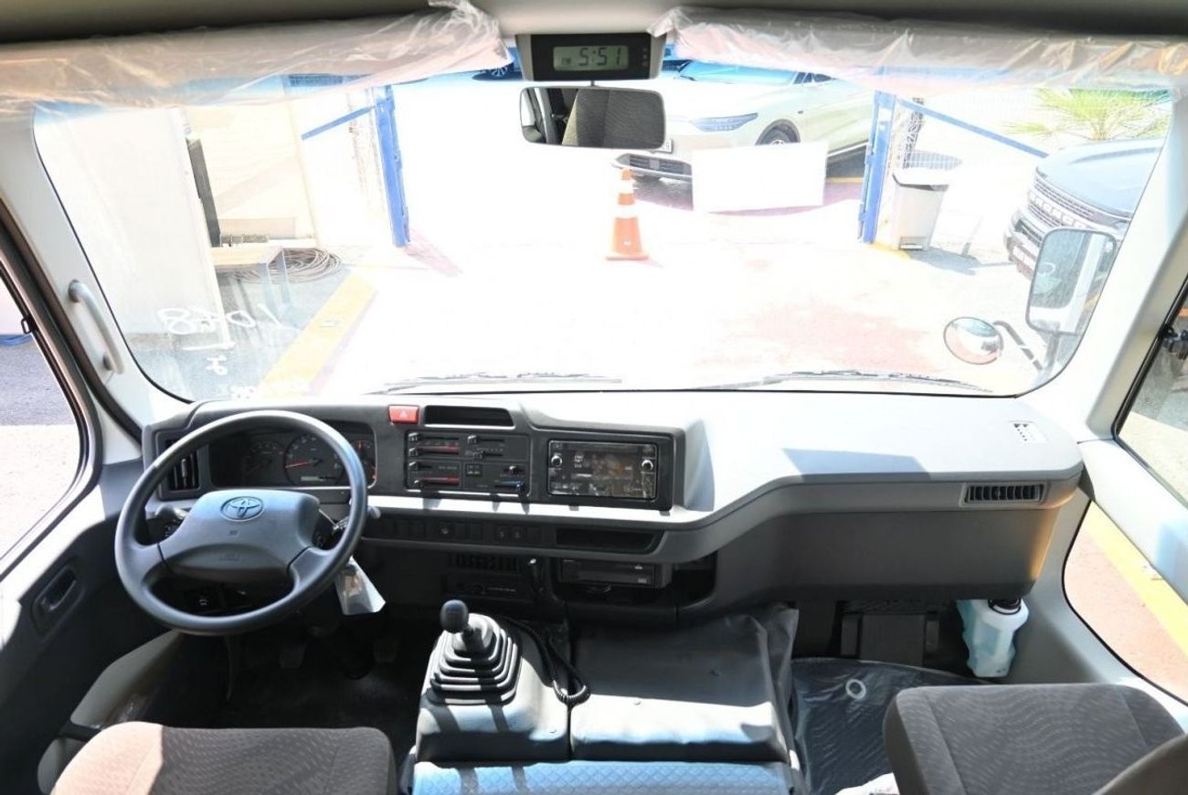 Toyota Coaster Toyota Coaster 4.2L Diesel, BUS, RWD, 2Doors Features: 23Seats, Manual Transmission, Auto Door Color