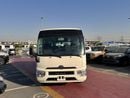 Toyota Coaster 2026 TOYOTA COASTER HIROOF 4.0L DIESEL M/T 22 SEATER 3PELR LUGGAGE RACK BRAND NEW 0KM