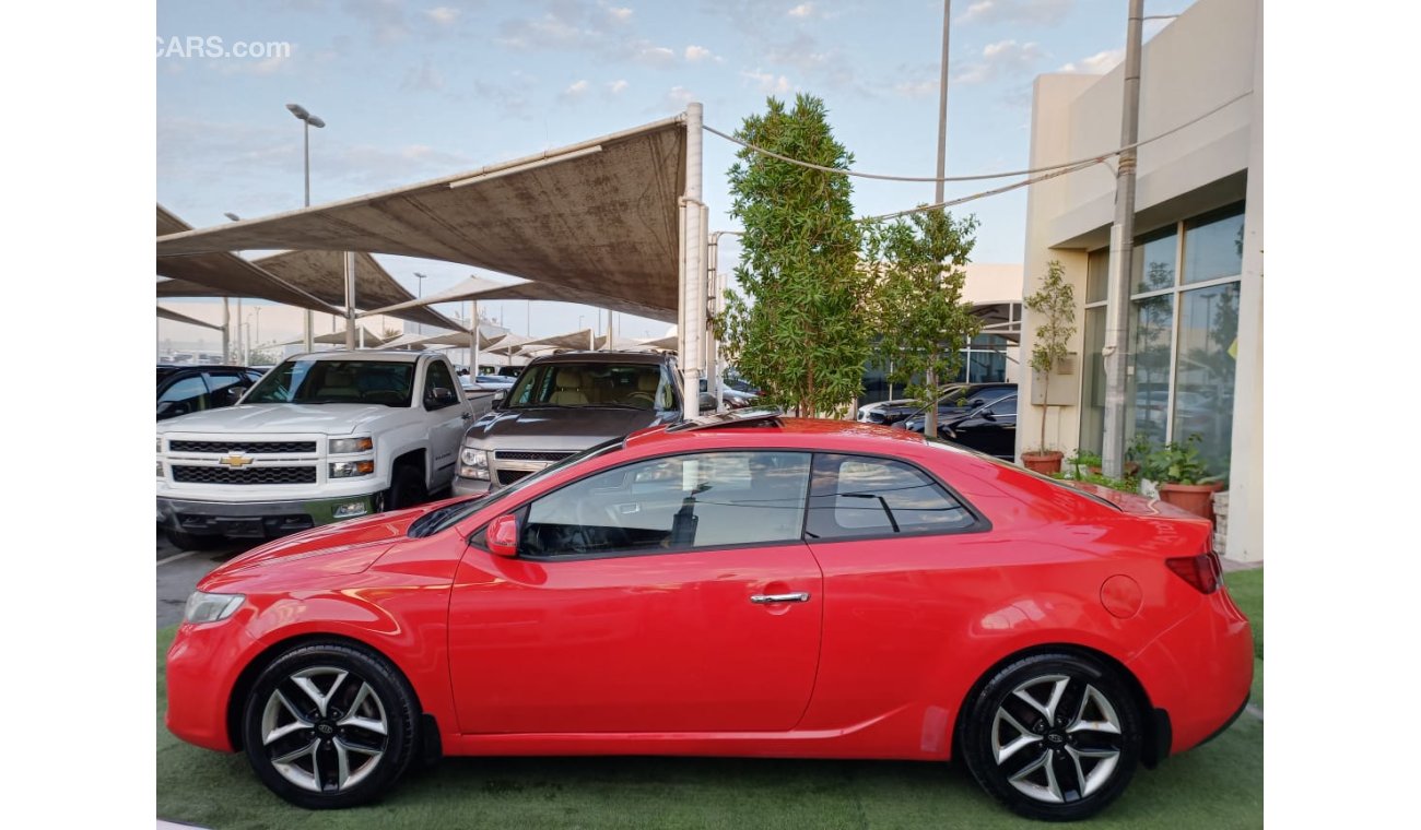 Kia Cerato Gulf model 2013 coupe number one hatch control stabilizer in excellent condition, you do not need an