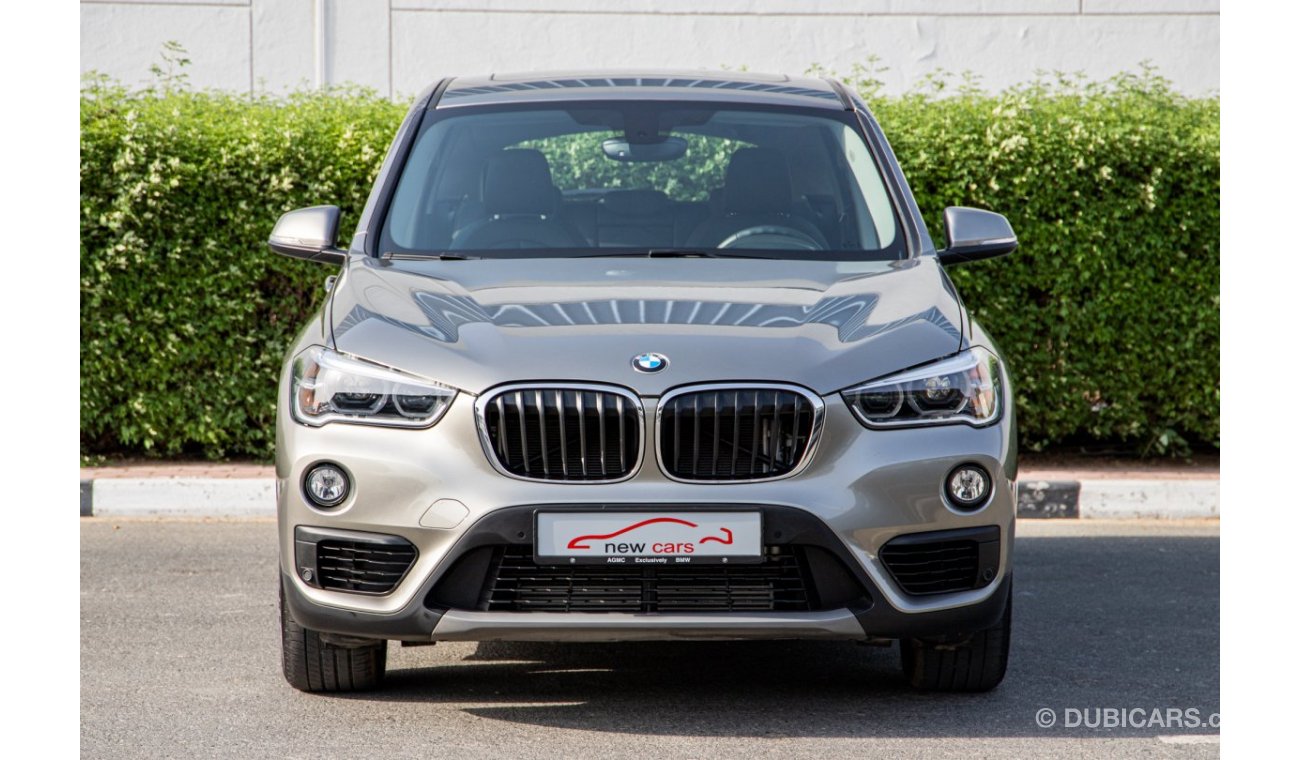 BMW X1 CAR REF #2965 - GCC - UNDER AGMC WARRANTY AND SERVICE FREE TIL 100,000KM