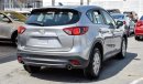 Mazda CX-5 Pre-owned Mazda CX-5 AWD for sale in Sharjah. Grey/Silver 2014 model, available at Wael Al Azzazi Sh