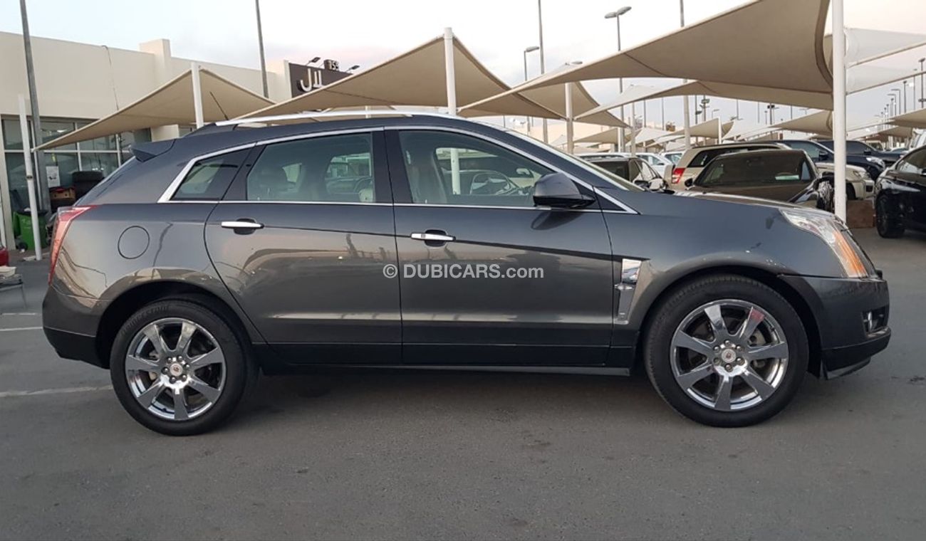 Cadillac SRX Caddillac SRX model 2011 GCC car prefect condition full option low mileage panoramic roof leather s