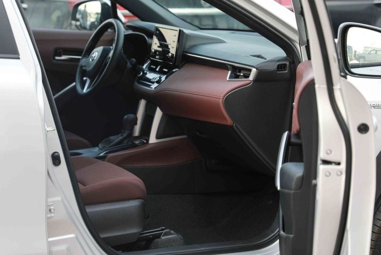 تويوتا كورولا كروس 2024 TOYOTA COROLLA CROSS 1.8 Hybrid MID - SILVER inside RED | Export Only
