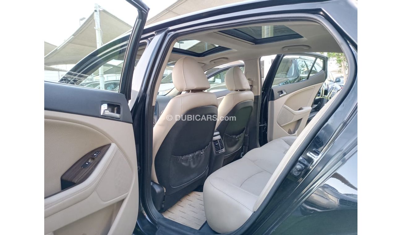 كيا أوبتيما موديل 2012 وارد أمريكى بانوراما مثبت سرعة تحكم خشب رنجات حساسات بحالة ممتازة