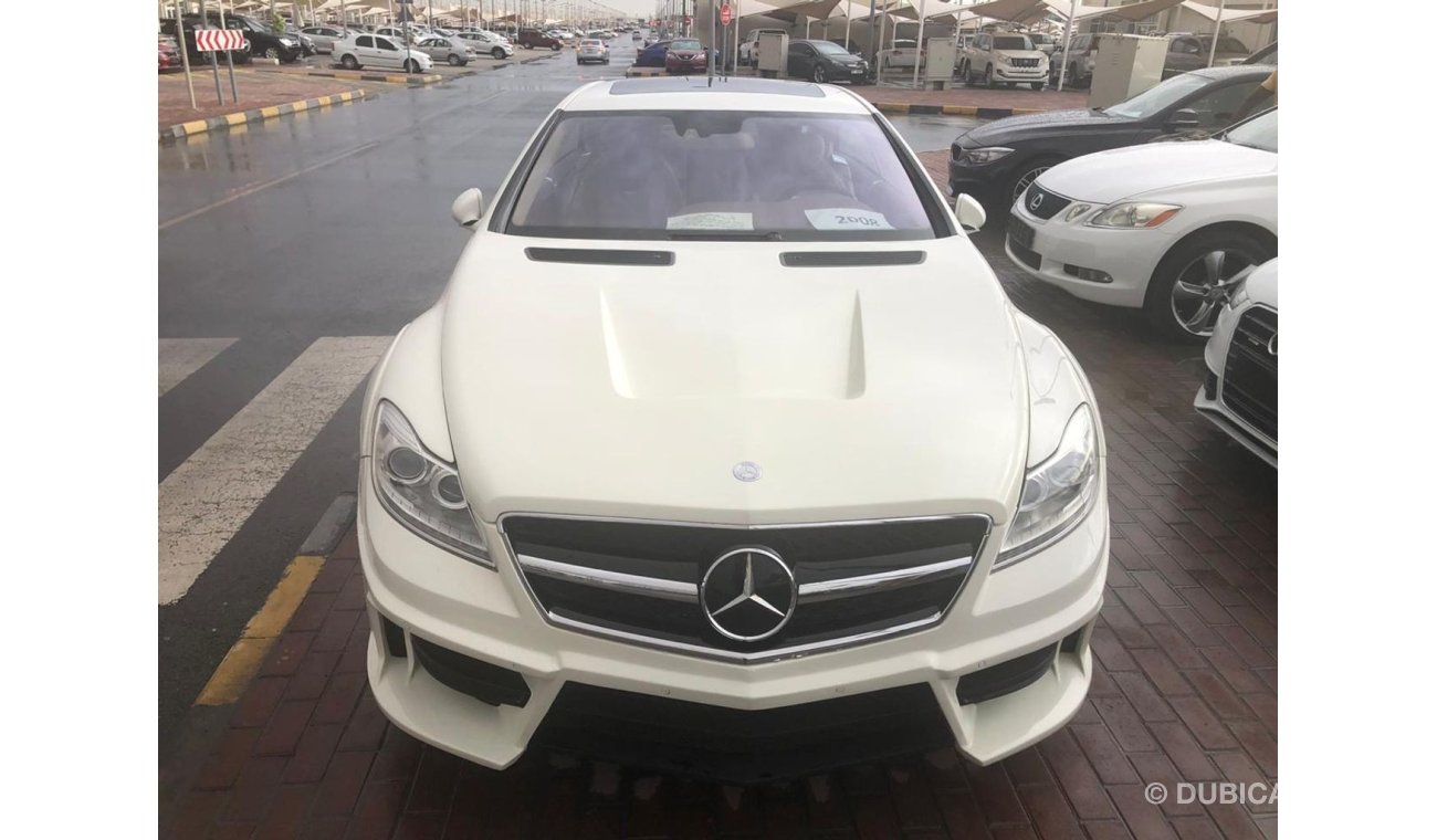 مرسيدس بنز CL 63 AMG السياره موديل 2008 خليجي فل اوبشن فتحه وجلد ورؤيه ليليه ونظام صوت ممتاز وتحكم كهربي وتحكم بالاستيرنج