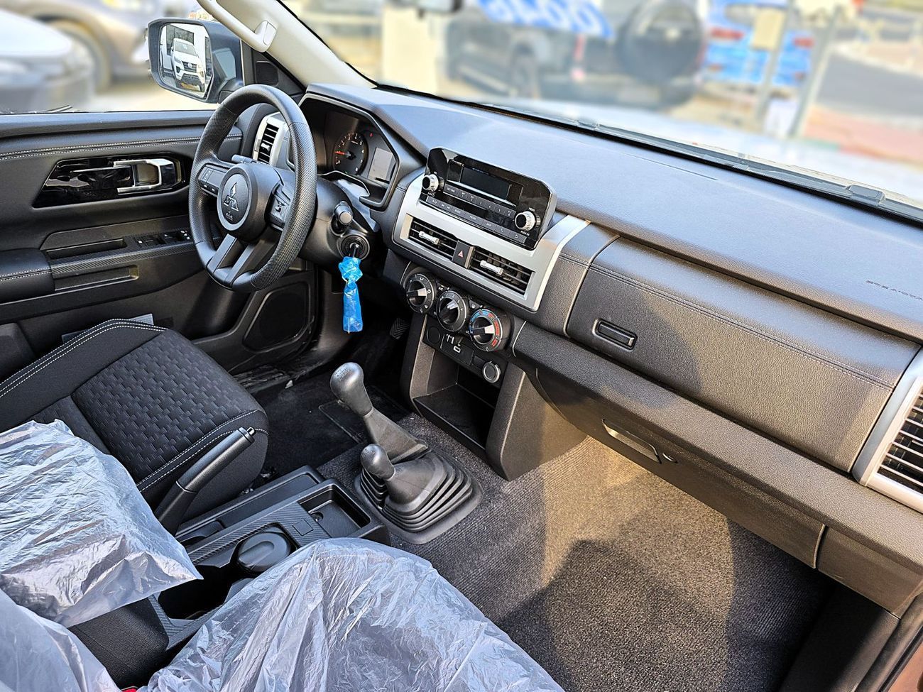 Mitsubishi L200 GL 2.4L (128 HP) Double Cab Utility L200 Pickup 4WD GL Petrol DC 5M/T - 2.4L 2025 Model Brown Color