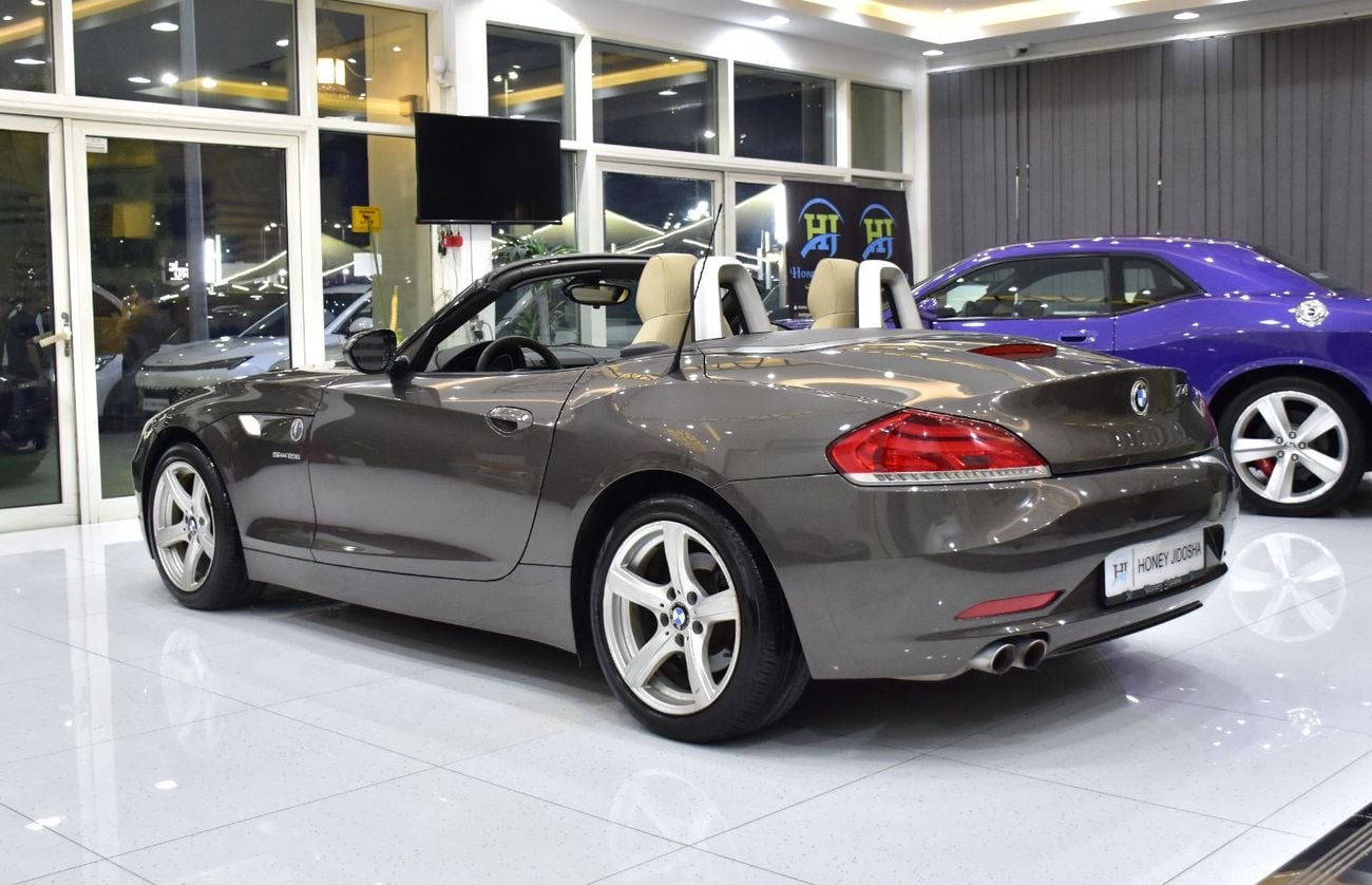 BMW Z4 sDrive 23i EXCLUSIVE EXCELLENT DEAL for our BMW Z4 sDrive23i ( 2012 Model ) in Brown Color GCC Specs