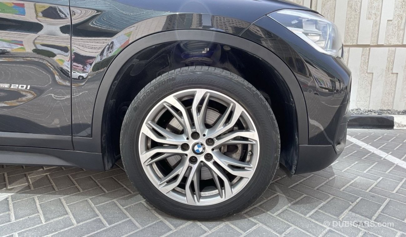 BMW X1 2.0L | GCC | EXCELLENT CONDITION | FREE 2 YEAR WARRANTY | FREE REGISTRATION | 1 YEAR COMPREHENSIVE I