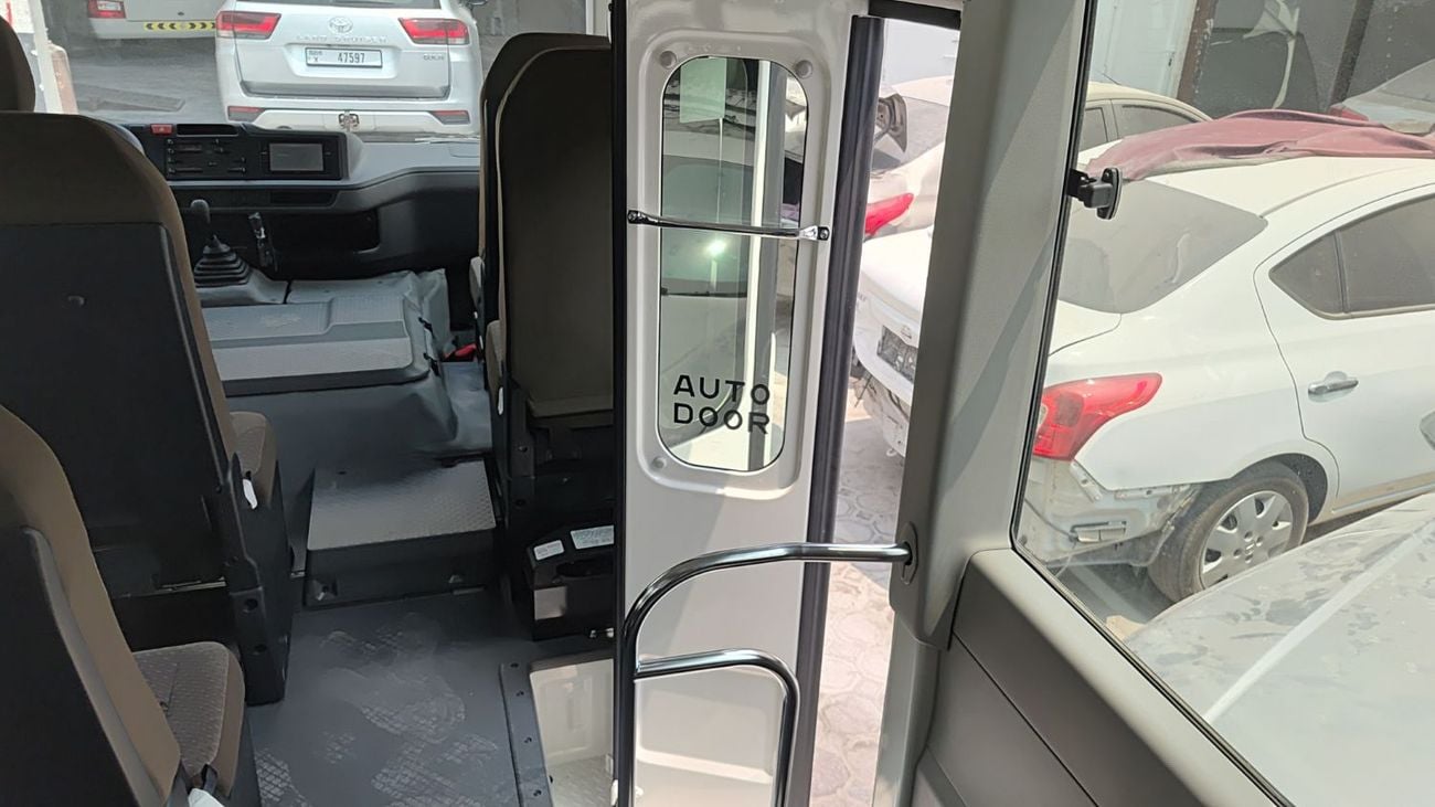 تويوتا كوستر ECTTAE004 - 2025 Toyota Coaster - 4.0L Diesel Manual – 23 Seats, Auto Door, 3PSB, Mic, Baggage Rack 