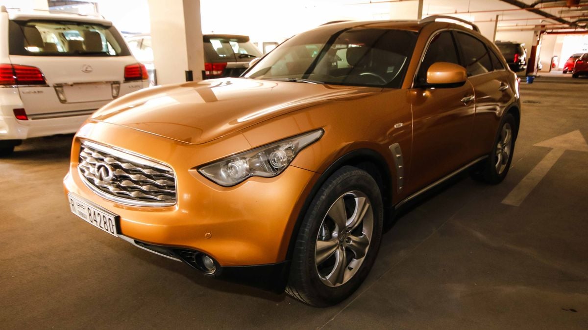 Infiniti FX35 for sale: AED 52,000. Gold, 2009