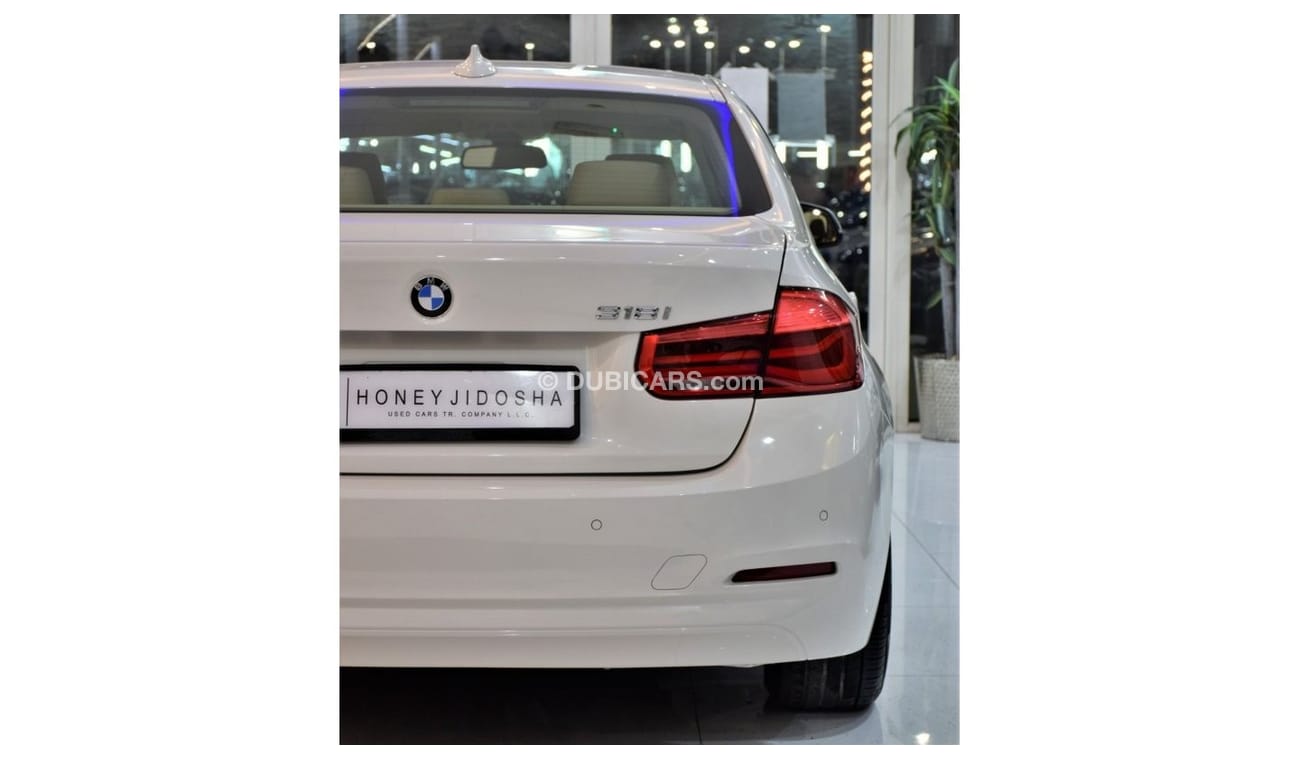 BMW 318i EXCELLENT DEAL for our BMW 318i ( 2018 Model! ) in White Color! GCC Specs