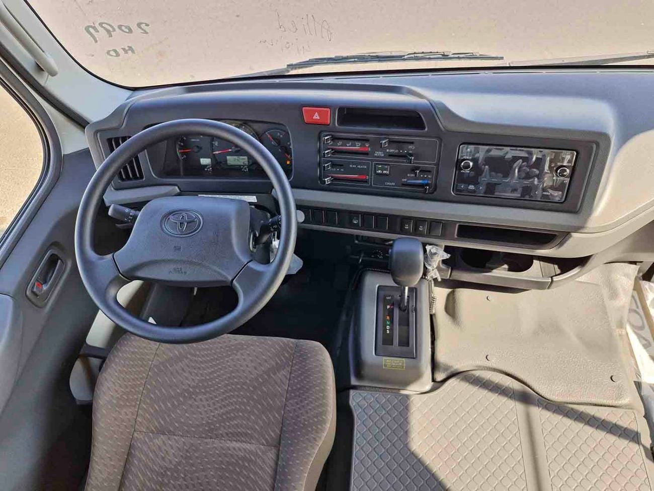 Toyota Coaster  ECTALM003 - 2026 Toyota Coaster – 2.8L Diesel Auto – 22 Seats, Cool Box