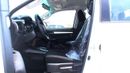 Toyota Hilux 2.4L diesel  . White 2025 model, M/T Wide body with Chrome bumper