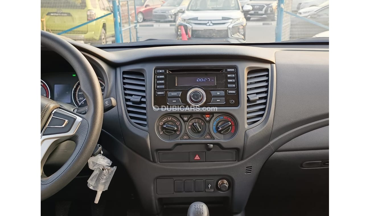 Mitsubishi L200 GLX 2.5L Diesel / M/T / 4WD / Black Rims / Streering Vol Control (Code # L2DDB)