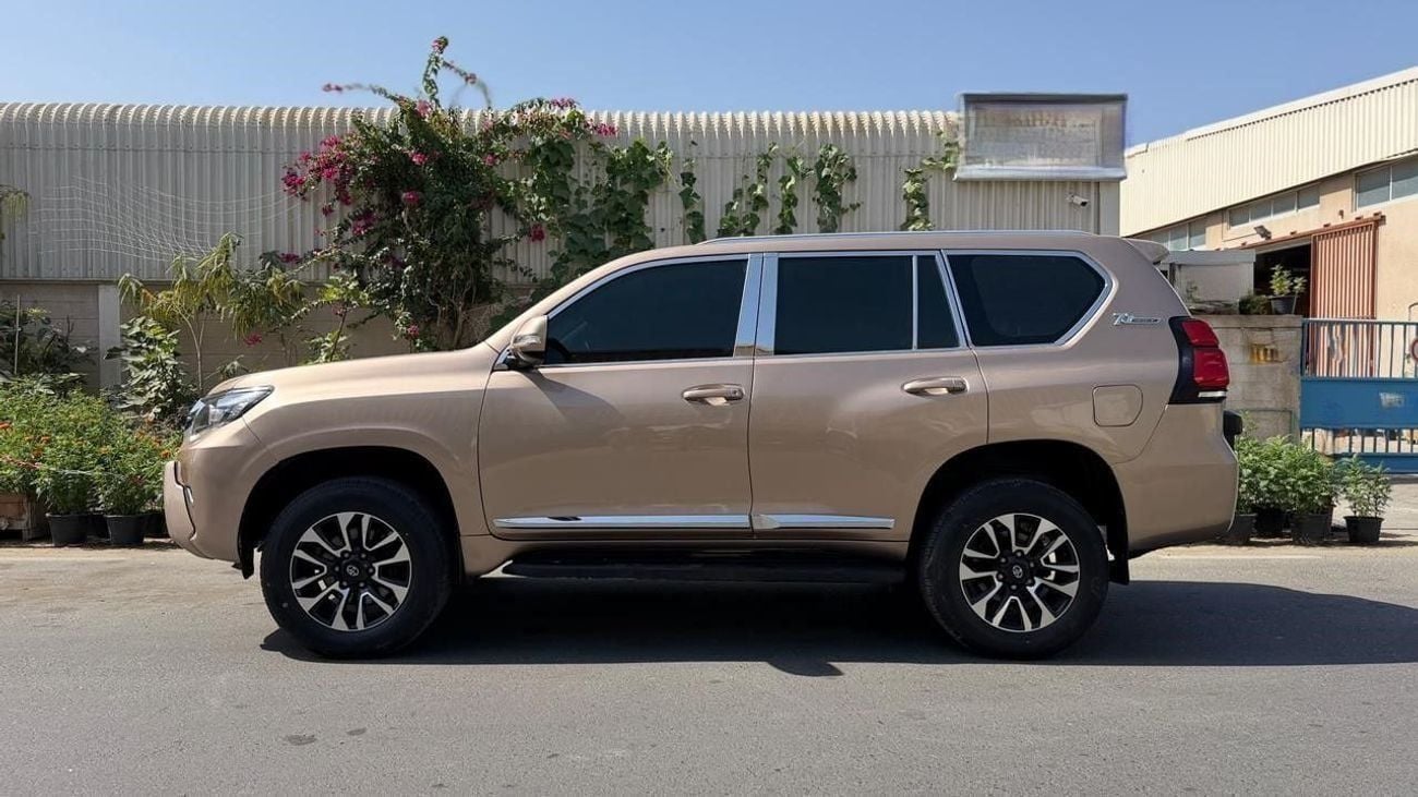 Toyota Prado 2011| 2.7L PETROL | AT | LHD | REAR HEADREST LCD SCREEN | BACK TRIE | PREMI