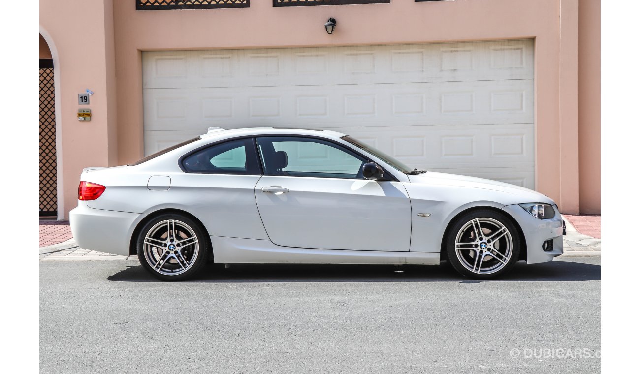 BMW 320i i Coupe (M-Kit) 2012 GCC with Zero Down-Payment.