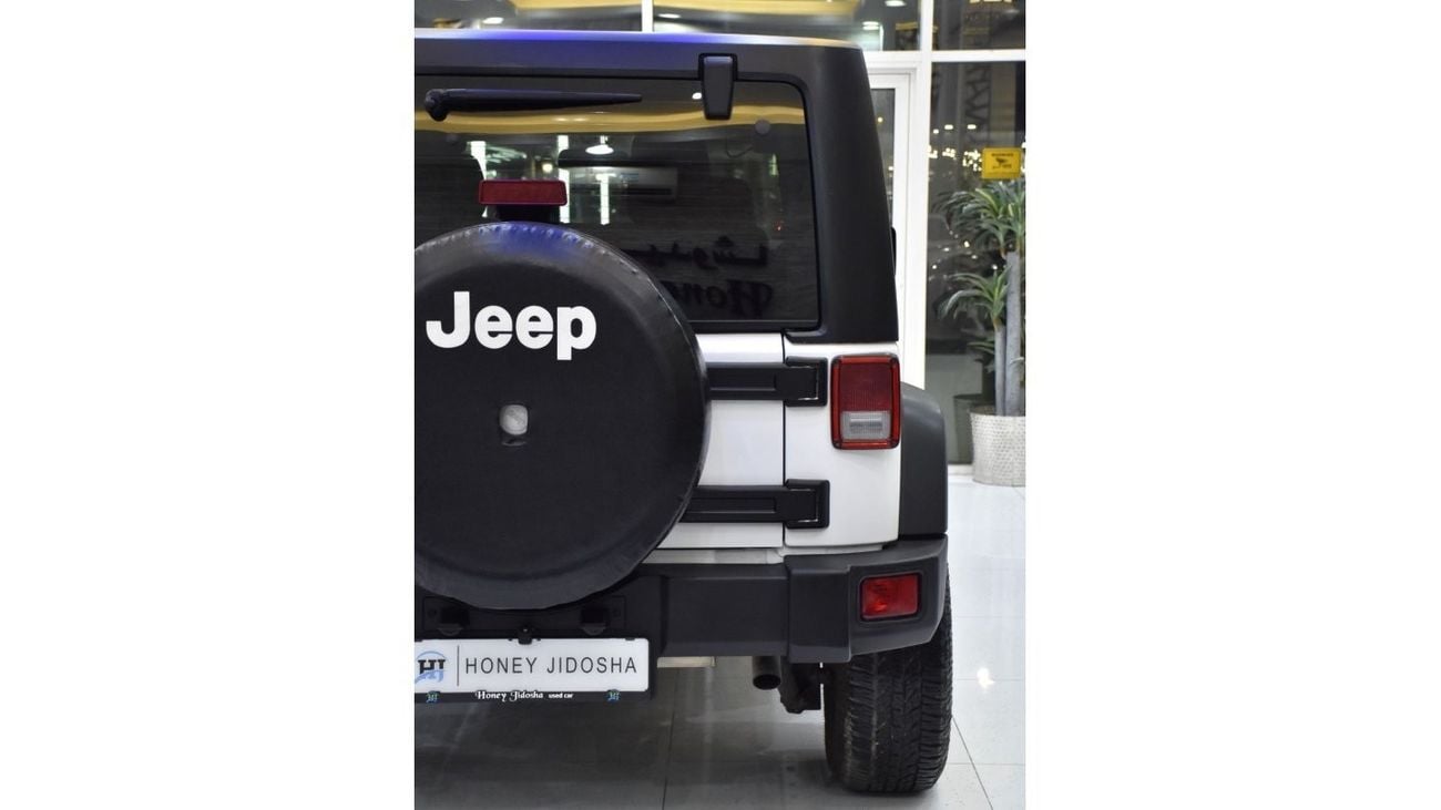 Jeep Wrangler EXCELLENT DEAL for our Jeep Wrangler Sport ( 2014 Model ) in White Color GCC Specs