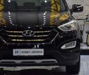 Hyundai Santa Fe EXCELLENT DEAL for our Hyundai SantaFe 4WD 3.3L ( 2014 Model ) in Black Color GCC Specs