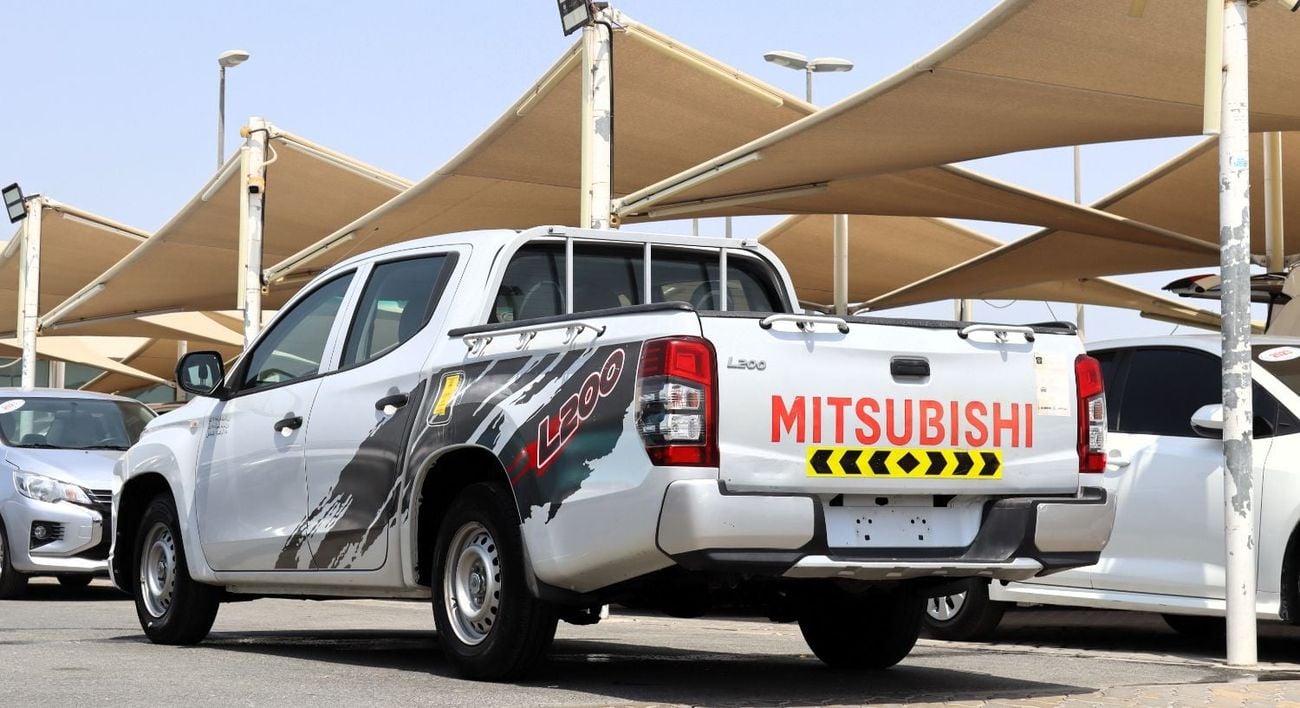 ميتسوبيشي L200 GL خالية من الحوادث - خليجية - دفع ثنائي - حالة ممتازة من الداخل والخارج