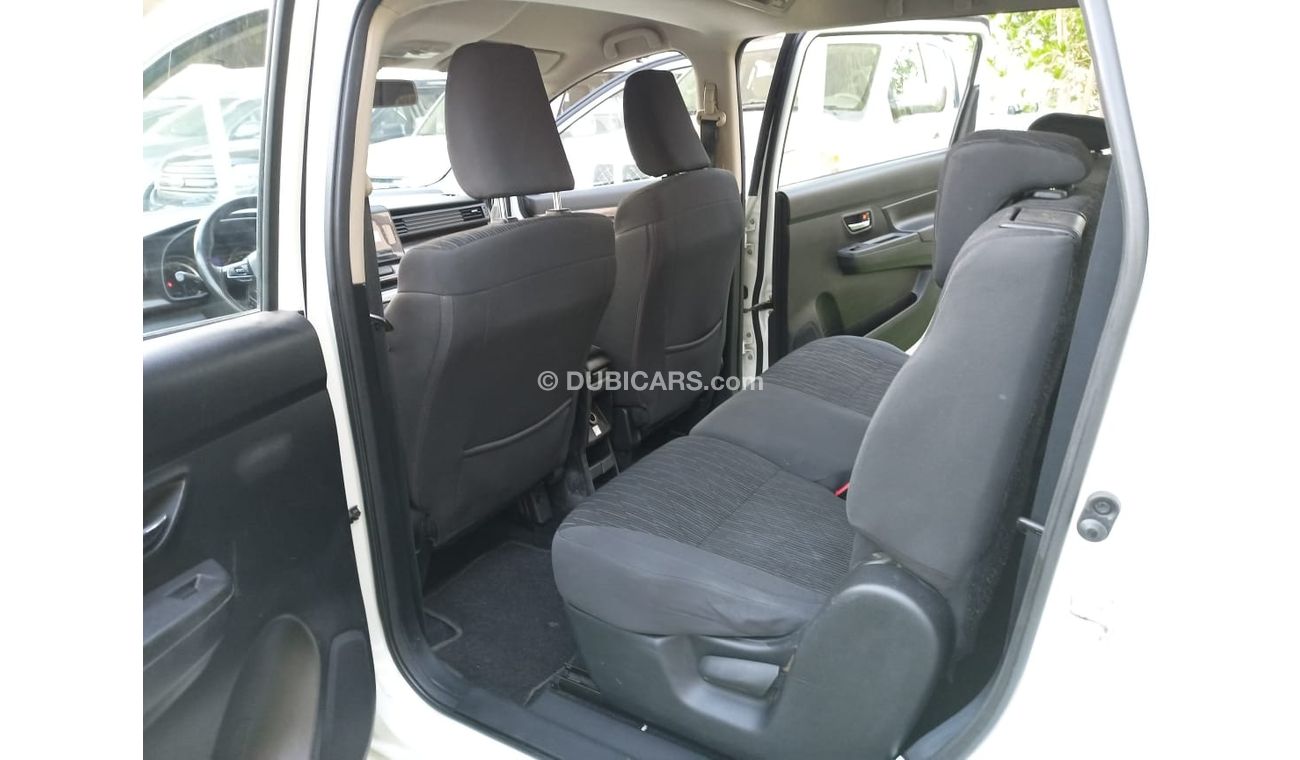 Suzuki Ertiga Gulf model 2019, agency dye, 1600 cc, imprint, white color, rear wing, alloy wheels, air conditionin