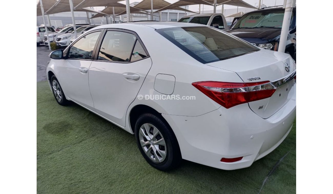 Toyota Corolla 1600 CC model 2016 GCC white color inside beige control unit in excellent condition