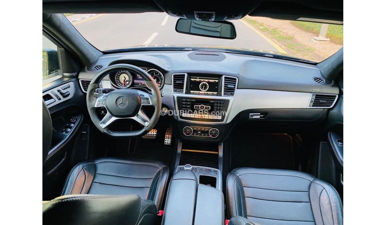 مرسيدس بنز ML 63 AMG Std مرسيدس بنز ML63 خليجي فل ابشن كاريون فايبر بحاله ممتازه