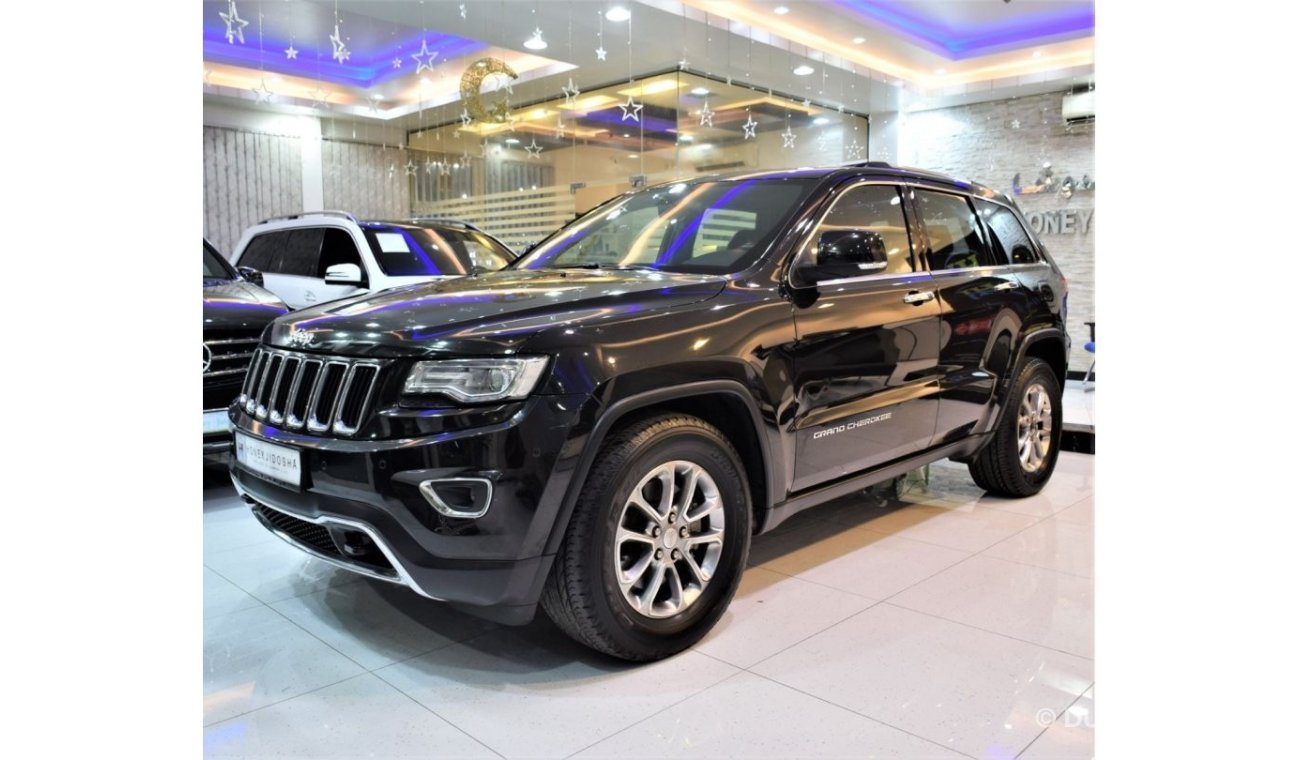 Jeep Grand Cherokee EXCELLENT DEAL for our Jeep Grand Cherokee 4x4 LIMITED 2014 Model!! in Black Color! GCC Specs